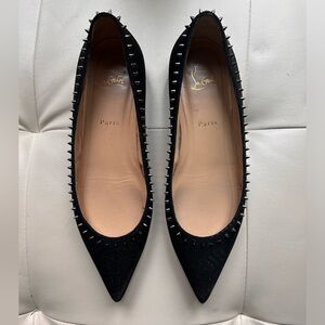 Christian Louboutin spike flats.